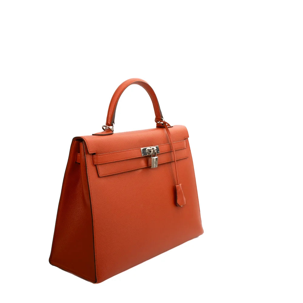 Hermes Picotin Lock 18 Orange Clemence Palladium Hardware – Madison Avenue  Couture