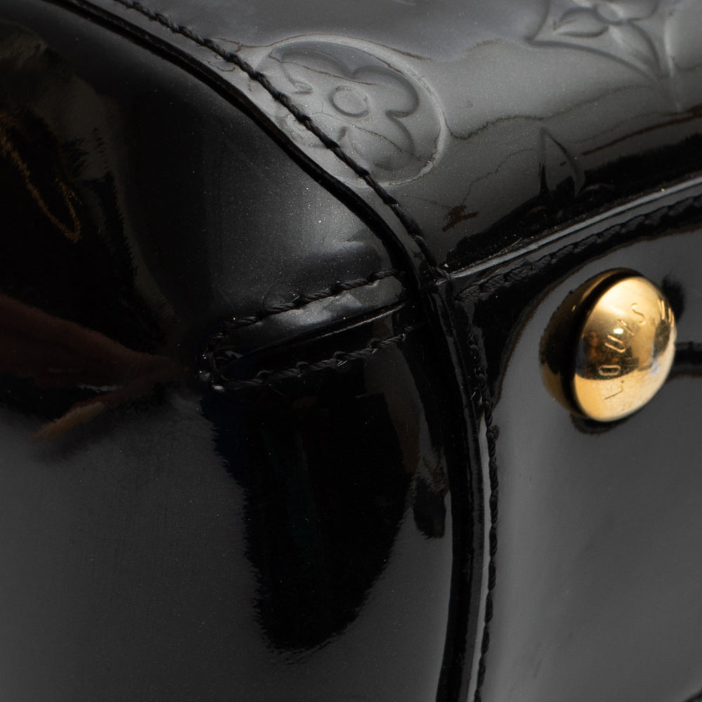 Montaigne BB bag in black imprint leather Louis Vuitton - Second Hand /  Used – Vintega