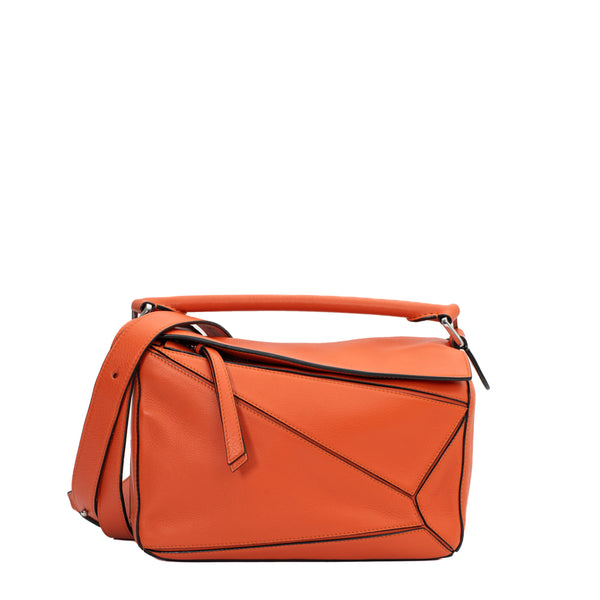 Puzzle Small bag in orange leather Loewe Second Hand Used