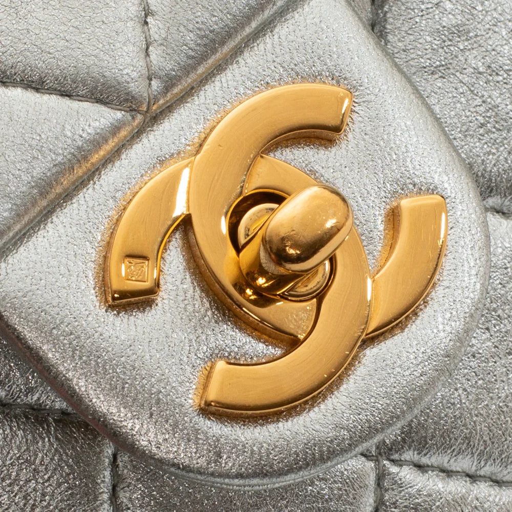 Chanel Timeless / Classic Extra Mini Vintage bag in silver leather 