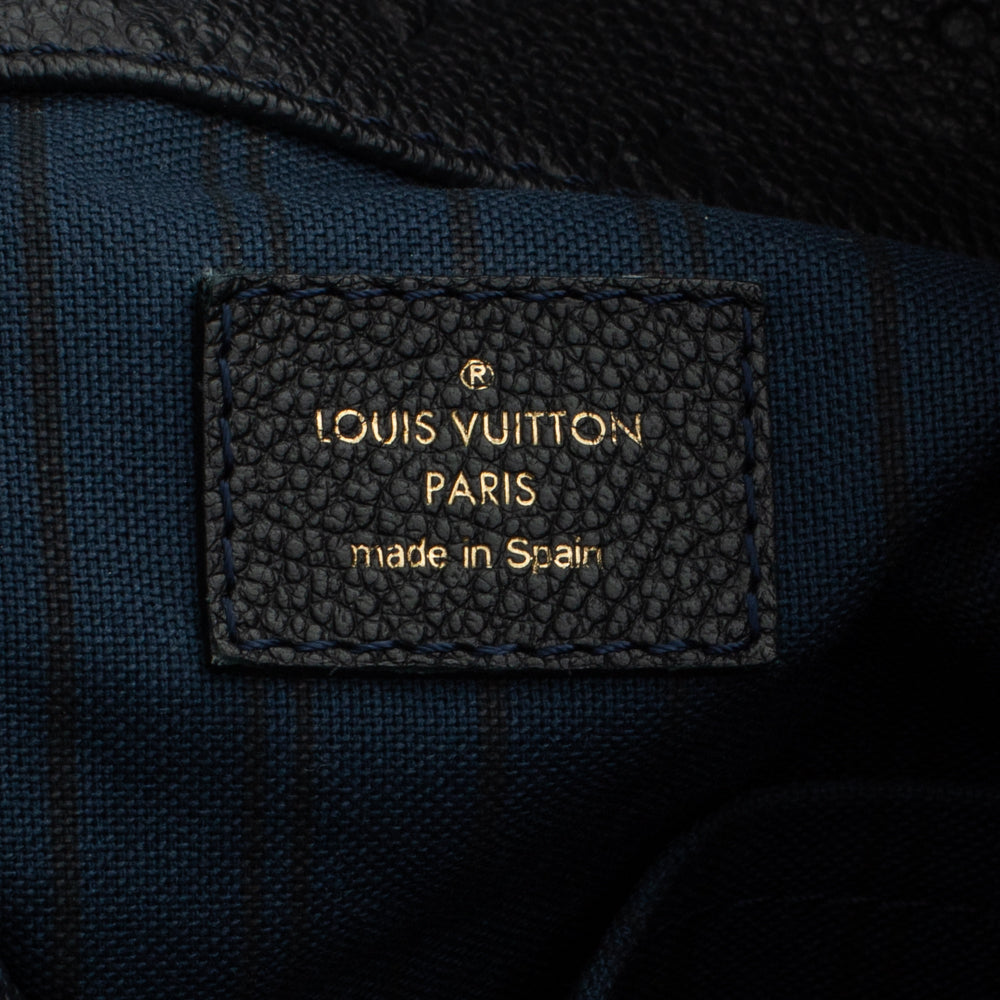 Blaue Louis Vuitton Artsy MM-Tasche aus geprägtem Leder - Gebraucht /  Gebraucht – Vintega